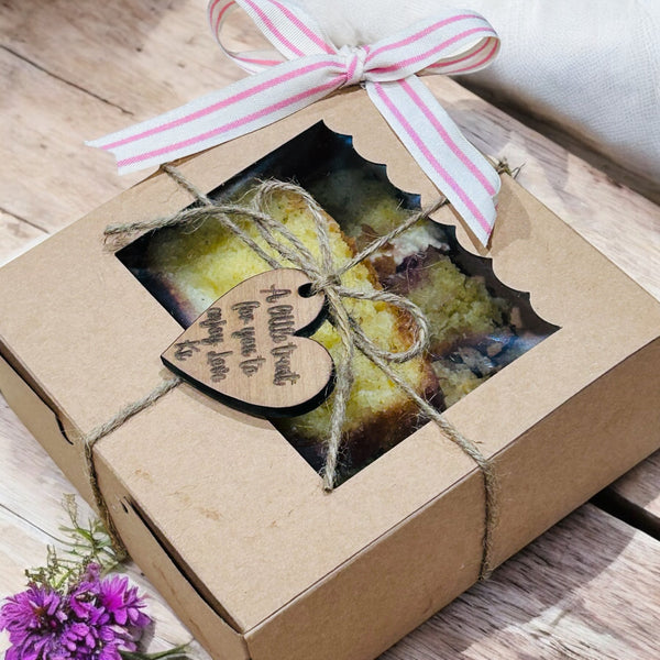 Four piece delicious treat box with personalised heart message